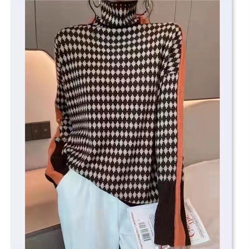 https://cdn.shopify.com/s/files/1/0826/7982/4718/files/4-main-loose-lazy-style-cashmere-bottoming-shirt-women-autumn-and-winter-2022-new-high-neck-long-sleeved-knitted-pullover-sweater.png?v=1718125089