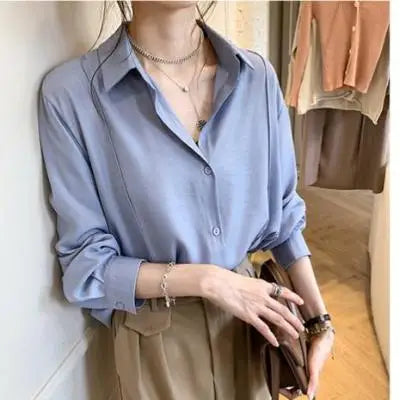 Women-s-shirt-white-plain-color-loose-oversized-blouse-women-s-Button-blouse-loose-Korean-4.jpg_620a0e4f-ef48-4291-aebd-b840fd15c170.webp