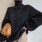 https://cdn.shopify.com/s/files/1/0826/7982/4718/files/lucia-comer-schwarzer-rollkragenpullover-newberlin-mode-54310385189190.jpg?v=1715839359